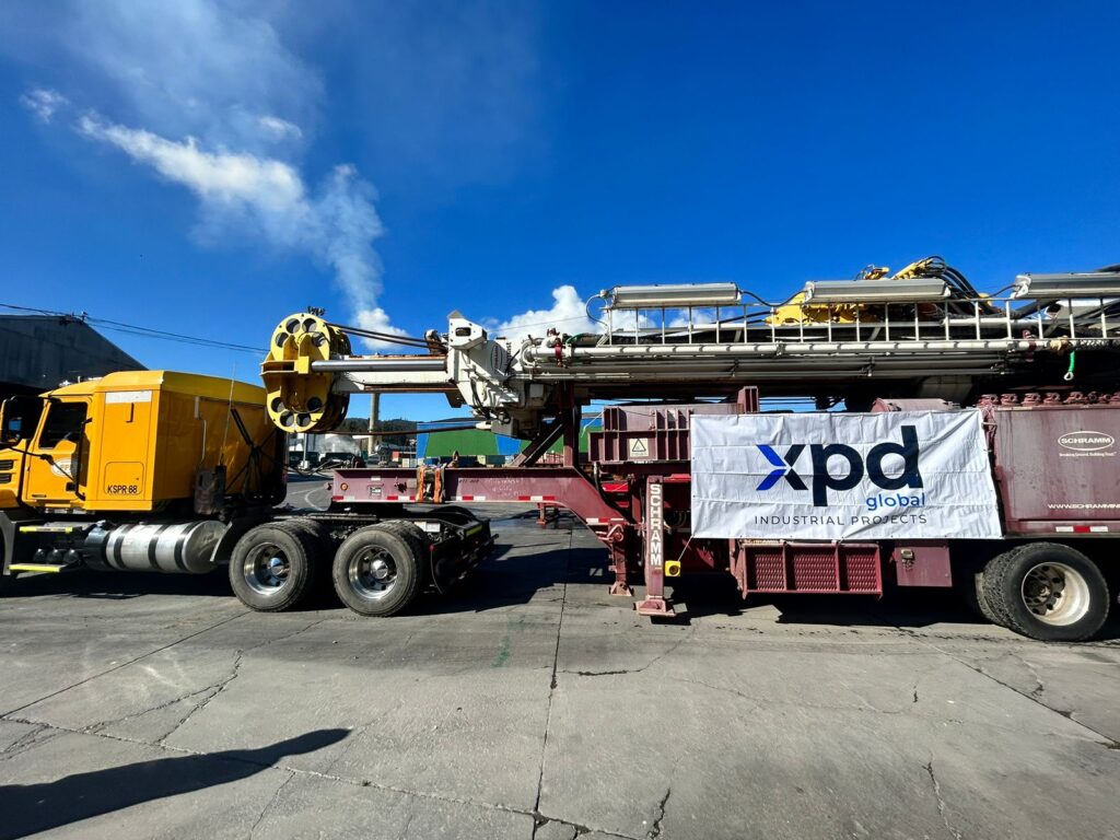 Oversized load identified with xpd global logo ready to be lifted to the ship.