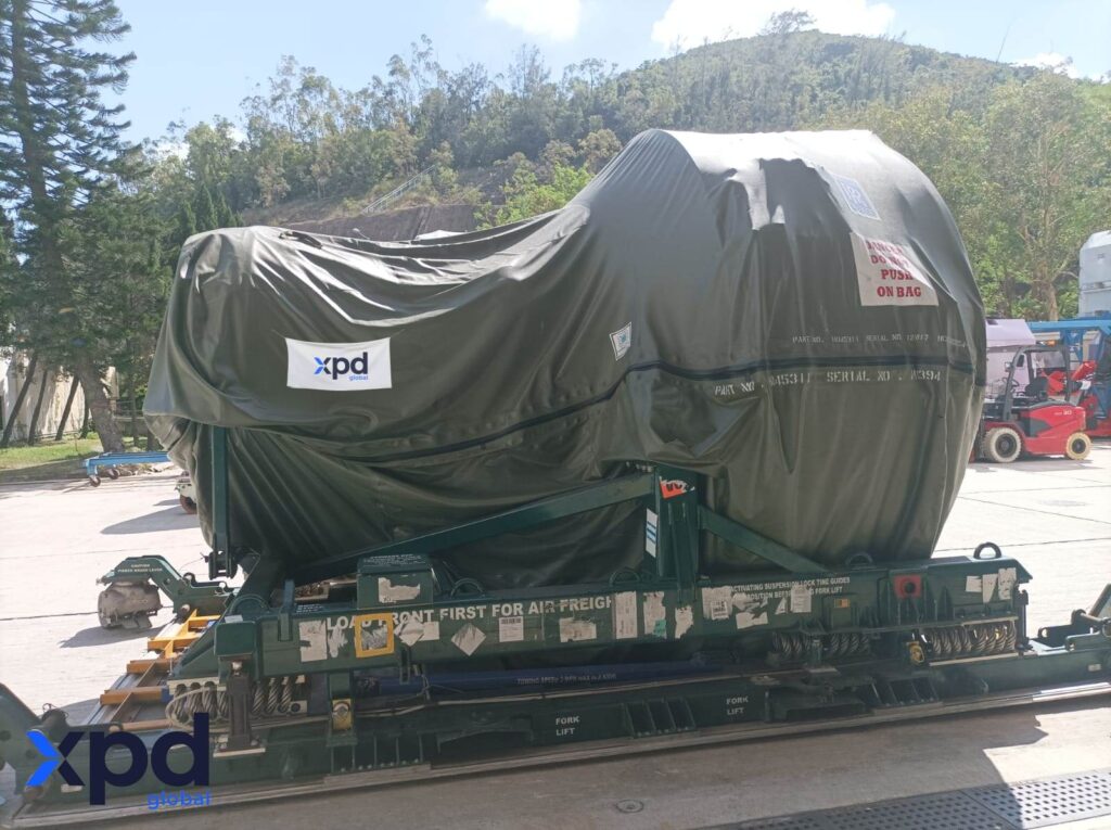 Rolls-Royce Trent 700 engine especially packed and signed with a xpd global identification, over a platform, ready to be safely shipped.